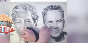 Orang Ini Melukis dengan Kedua Tangannya