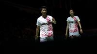 Reaksi kecewa pebulutangkis ganda campuran Indonesia, Dejan Ferdiansyah/Gloria Emanuelle Widjaja saat bertanding melawan pebulutangkis ganda campuran Jepang, Yuki Kaneko/Misaki Matsumoto pada laga perempatfinal Indonesia Masters 2023 di Istora Senayan, Jakarta, Jumat (27/01/2023). Apri/Fadia kalah dengan skor 21-16, 17-21, 18-21. (Bola.com/Bagaskara Lazuardi)