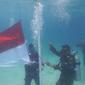 Upacara pengibaran bendera di bawah laut dilaksanakan di Pulau Pahawang, yang dipimpin langsung Komandan Brigade Infanteri (Danbrigif) 4 Marinir/BS, Kolonel Marinir Harry Indarto.