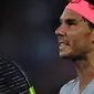 Rafael Nadal bereaksi pada perempat final Australia Terbuka 2018 melawan Marin Cilic di Rod Laver Arena, Selasa (23/1/2018). (AFP/Paul Crock)