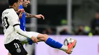 Jerman saat mengalahkan Italia 2-1 di perempat final UEFA Nations League. (Marco BERTORELLO / AFP)