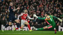 The Gunners tampil dominan sejak dimulainya babak pertama. Mereka bahkan berhasil unggul 4-0 sebelum turun minum. (AFP/Glyn Kirk)