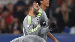 Pemain Real Madrid, Jese Rodriguez mencetak satu gol untuk kemenangan timnya atas tuan Rumah AS Roma  pada leg pertama babak 16 besar Liga Champions, di Olimpico, Roma. (AFP / Alberto Pizzoli)