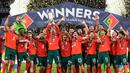 Timnas Portugal berhasil keluar sebagai juara UEFA Nations League 2025 setelah menaklukkan Timnas Spanyol lewat drama adu penalti di Allianz Stadium, Senin (09/06/2025) dini hari WIB. (AP Photo/Matthias Schrader)