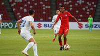 Bek Singapura, Shakir Hamzah, dipastikan tak akan lagi bermain di Piala AFF 2020 karena mengalami cedera.(dok. AFF)