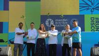 Bintan Marathon 2025 Makin Berwarna, Bank Mandiri Gaungkan Aksi Hijau lewat Livin’ Planet dan  Mandiri Looping For Life
