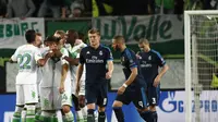 Pemain Wolfsburg melakukan selebrasi usai cetak gol ke gawang Madrid (AFP)