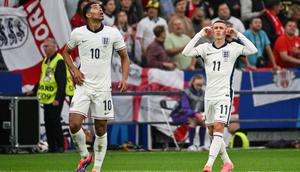 Dua bintang Timnas Inggris: Jude Bellingham dan Phil Foden di Euro 2024. (Alberto PIZZOLI / AFP)