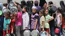 Sebelumnya, pada Sabtu (16/8/2025) melalui platform media sosial X, Badan Bantuan Perserikatan Bangsa-Bangsa (PBB) untuk Pengungsi Palestina di Kawasan Timur Tengah (UNRWA) menyampaikan sekitar satu juta perempuan dan anak perempuan menghadapi kelaparan massal, kekerasan, dan pelecehan di Gaza. (Eyad BABA/AFP)