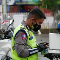 Ilustrasi mimpi ditangkap polisi/Copyright shutterstock/Joko P