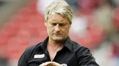 Stuttgart's coach Armin Veh gestures during the Bundesliga football match of VfB Stuttgart against Bayer Leverkusen at the Mercedes-Benz Arena stadium in Stuttgart, southern Germany, on August 23, 2008. AFP PHOTO DDP/OLIVER LANG