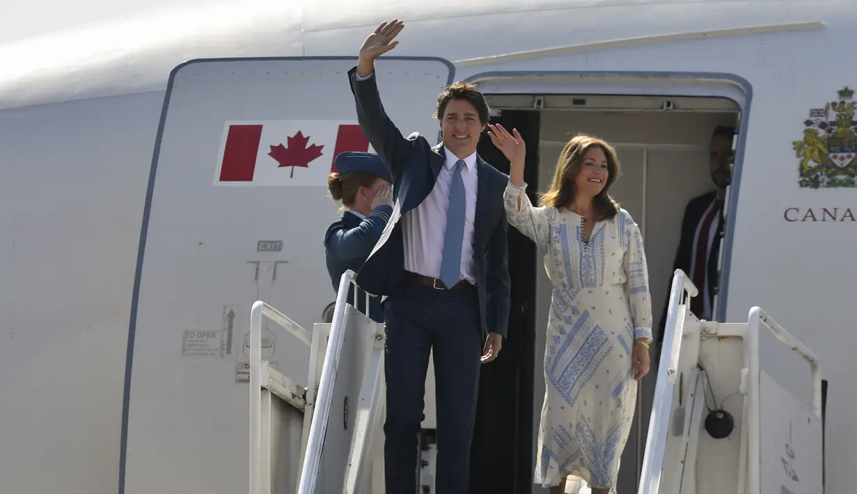 Trudeau dikaruniai tiga anak dalam pernikahan tersebut, yakni dua anak lelaki Xavier dan Hadrien, serta seorang anak perempuan Ella-Grace. (CLAUDIO CRUZ / AFP)