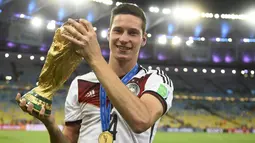 Ketika masih berusia 21 tahun, Julian Draxler sudah dipercaya untuk masuk ke skuat Jerman untuk Piala Dunia 2014. Namun Draxler hanya satu kali diberikan kesempatan bermain, yakni ketika bertemu Brasil di babak semifinal. (AFP/Fabrice Coffrini)