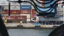 Aktivitas di Jakarta International Container Terminal, Jumat (15/3). BPS mencatat nilai ekspor pada Februari 2019 tercatat sebesar US$12,53 miliar atau turun 10,05 persen dari bulan sebelumnya, yakni US$13,93 miliar.(Liputan6.com/Helmi Fithriansyah)