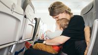 Ilustrasi bayi di pesawat. (dok. unsplash/Novi Thedora)