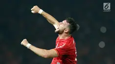 Pemain depan Persija, Marko Simic melompat saat merayakan gol yang dicetaknya ke gawang Tampines Rovers pada penyisihan grup H Piala AFC 2018 di Stadion GBK, Jakarta, Rabu (28/2). Persija unggul 4-1. (Liputan6.com/Helmi Fithriansyah)