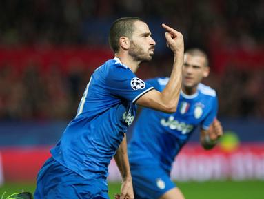 Juventus meraih kemenangan 3-1 atas Sevilla pada laga kelima Grup H Liga Champions di Estadio Ramon Sanchez Pizjuan, Selasa (22/11/2016). (AFP/Jorge Guerrero)