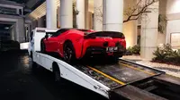 Kejaksaan Agung menyita sejumlah mobil mewah dalam kasus dugaan suap penanganan perkara di Pengadilan Negeri Jakarta Pusat. (Liputan6.com/Ady Anugrahadi).