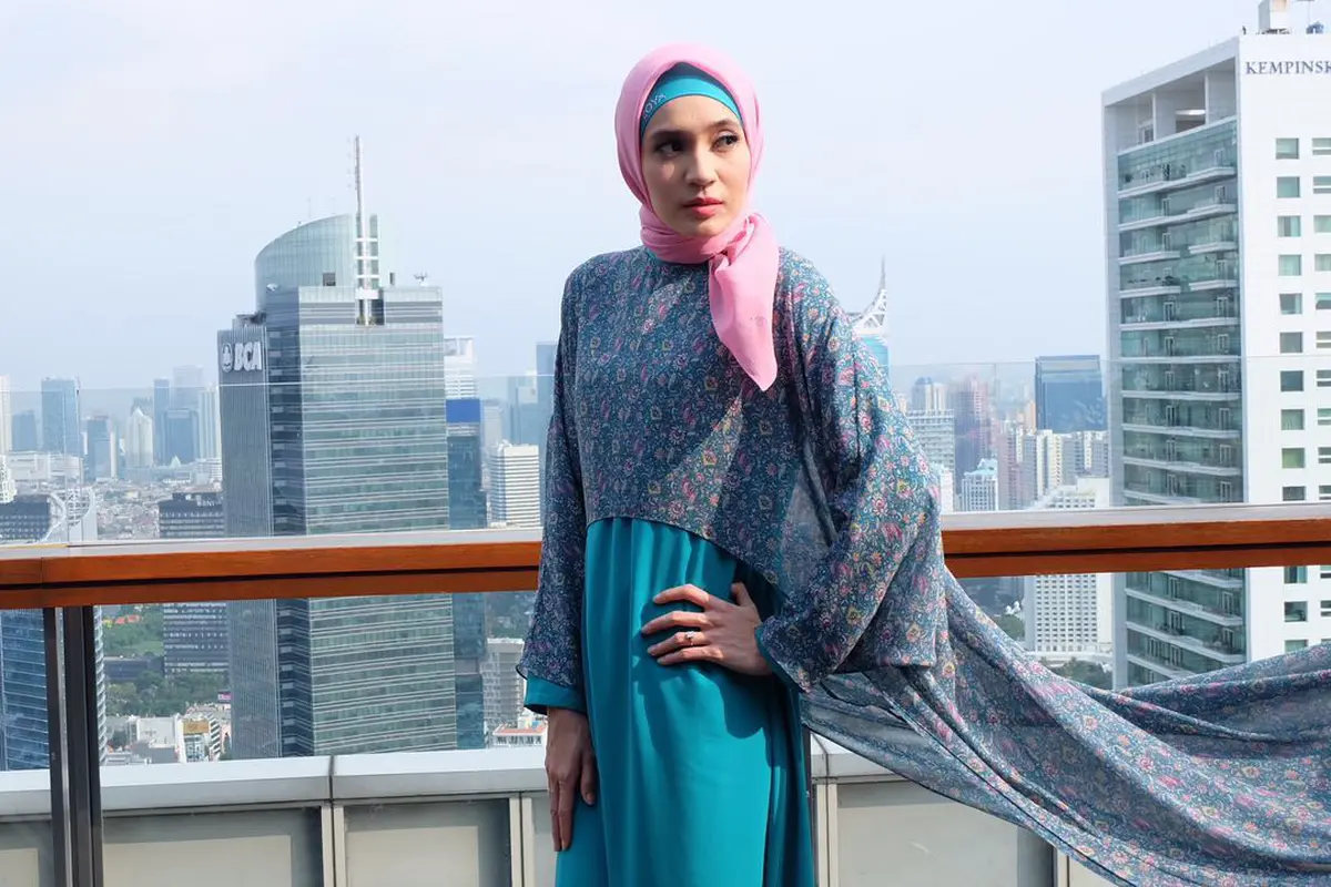 Dhini Aminarti