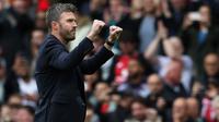 Pelatih sementara Manchester United asal Inggris, Michael Carrick, bereaksi setelah pertandingan Liga Inggris antara Manchester United dan Liverpool di Old Trafford, Manchester, barat laut Inggris, pada 3 Mei 2026. (Darren Staples/AFP)