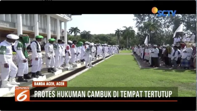 Unjuk rasa ormas Islam, ricuh, karena menolak kebijakan peraturan Gubernur Aceh tentang hukuman cambuk.