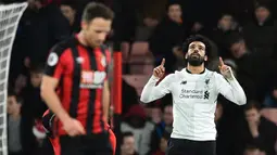1. Mohamed Salah (Liverpool) - 14 Gol. (AFP/Glyn Kirk)