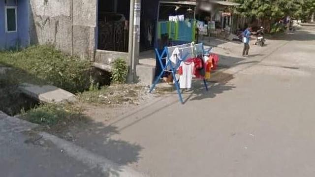 Jalan dijadikan tempat jemuran (Ist)