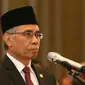 Ketua DK OJK yang baru, Wimboh Santoso saat mengikuti pelantikan, Jakarta, Kamis (20/7). Anggota DK OJK periode 2017-2022 tersebut yakni Wimboh Santoso sebagai Ketua DK OJK. (Liputan6.com/Angga Yuniar)