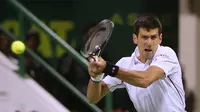 Novak Djokovic (KARIM JAAFAR / AL-WATAN DOHA / AFP)