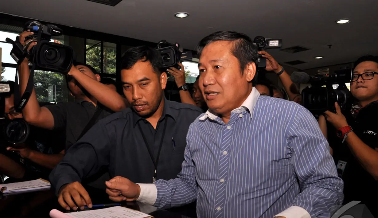 Komisioner Komisi Yudisial (KY) Taufiqurrahman Syahuri mendatangi kantor KPK, Jakarta, Selasa (30/9/2014) (Liputan6.com/Miftahul Hayat)