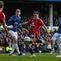 Gelandang Manchester United (MU), Manuel Ugarte, melepaskan tembakan yang berbuah gol kedua timnya kala bertandang ke Goodison Park, markas Everton, pada laga pekan ke-26 Premier League 2024/2025, Sabtu (22/2/2025) malam WIB. MU membawa pulang satu poin setelah bermain imbang 2-2 dengan The Toffees. (Paul ELLIS / AFP)