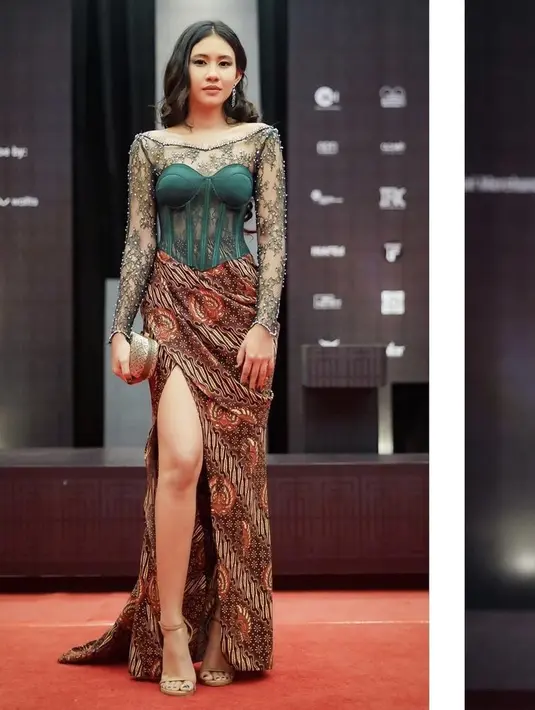Melalui tangan dingin Stylist Wanda Hara, Shena Cinnamon tampil stylish dengan kebaya hijau yang terinspirasi oleh nyi roro dengan kain yang memamerkan kaki jenjangnya. Dok. @wanda_haraa.