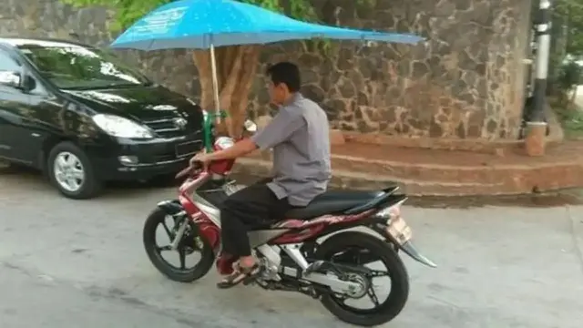 Kumpulan Potret Cara Unik Pemotor Mencegah Kulit Tersengat Panasnya Sinar Matahari (ist)