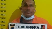 Tersangka pencurian infaq yang ditahan di Polsek Tampan, Pekanbaru. (Liputan6.com/M Syukur)