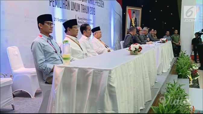 Pasangan capres dan cawapres Jokowi-Ma'ruf Amin dan Prabowo Subianto-Sandiaga Uno di KPU. (Liputan6.com)