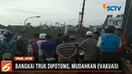 Ditargetkan seluruh bangkai truk dapat dievakuasi paling lambat hari Kamis esok.