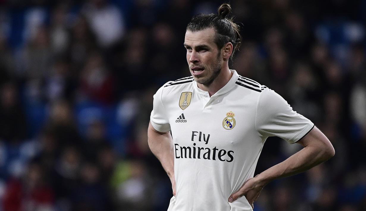 1. Gareth Bale - Dirinya bukan sosok pemain yang dicintai suporter Real Madrid, menjualnya menjadi pilihan tepat karena gelandang asal Wales ini masih memiliki harga jual yang tinggi dan banyak peminatnya. (AFP/Javier Soriano)
