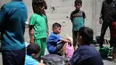 Sementara, menurut Kantor Media Pemerintah Gaza, sedikitnya 67 anak telah meninggal karena kelaparan sejak konflik antara Israel dan milisi Hamas berkecamuk di Gaza pada 7 Oktober 2023. (Eyad BABA/AFP)