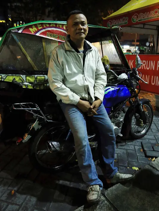 Muhammad Idris, driver Bentor. Sekarang Medan bisa dibilang macam anak emas karena Medan dapat menantu anak Presiden. Kami ikut senang, cuma kalau ditanya soal dampak tak membawanya banyak pengaruh untuk kami. (Deki Prayoga/Bintang.com)