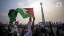 “Palestina merdeka! Palestina merdeka!” sorak peserta aksi. (Liputan6.com/Angga Yuniar)