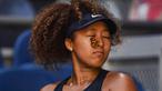 Seekor kupu-kupu sempat hinggap di hidung Naomi Osaka saat berlaga di babak ketiga Australia Open 2021. (Foto: AFP/Paul Crock)