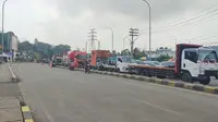Kepadatan kendaraan di exit tol Parungkuda (Bocimi seksi 3) Kabupaten Sukabumi. (Liputan6.com/Fira Syahrin).