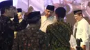 Mantan Ketua MK, Mahfud MD dan Wagub Jawa Timur Saifullah Yusuf saat diatas panggung dalam peringatan Sewindu Haul Gus Dur di Jakarta, Jumat (22/12). Peringatan tersebut mengangkat tema Semua Demi Bangsa dan Negara. (Liputan6.com/Herman Zakharia)