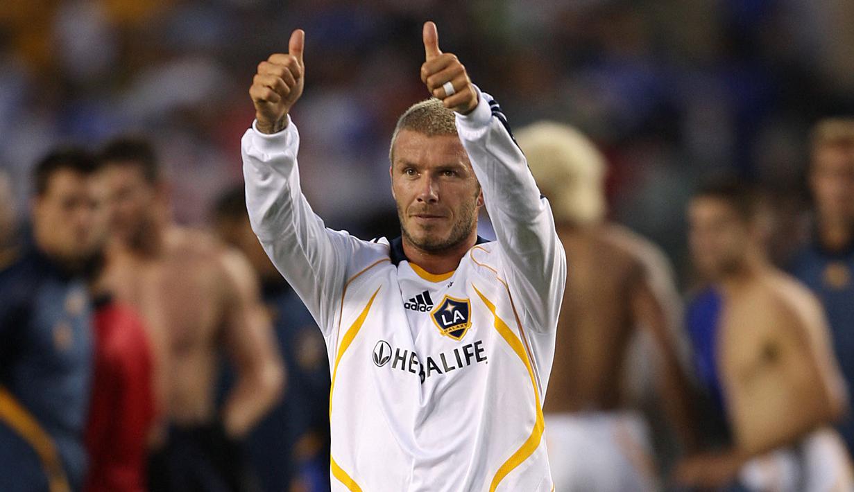 David Beckham meninggalkan Real Madrid menuju LA Galaxy pada 2007 silam. Legenda Inggris ini bisa dibilang merupakan pemain top dunia pertama yang pindah menuju Liga Amerika (MLS) di era modern. Dirinya juga dianggap sebagai salah satu tokoh terpenting dalam sejarah liga. Beckham sendiri mampu tampil impresif meski di usianya yang tak lagi muda dengan mencetak 18 gol dan memberikan 46 assist dalam 124 penampilannya. Ia juga sukses membawa tiga gelar liga dan dua Piala MLS selama lima tahun di klub. (AFP/Robyn Beck)