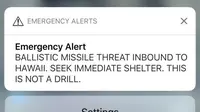 Notifikasi ancaman misil di Hawaii (13/1/2018) yang ternyata sebuah 'false alarm' alias imbauan palsu (supplied via The New York Times)