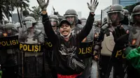 Sebelumnya, dikabarkan sejumlah aliansi masyarakat akan menggelar aksi unjuk rasa di depan gedung DPR/MPR RI pada Senin 25 Agustus 2025. (YASUYOSHI CHIBA/AFP)