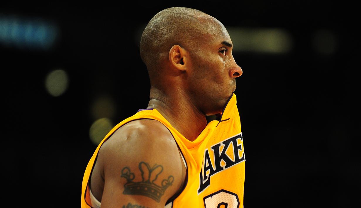 Ekspresi Kobe Bryant saat pertandingan LA Lakers melawan LA Clippers dalam laga basket NBA di Staples Center, Los Angeles, California, AS, (14/2/2013). (AFP/Frederic J. Brown)