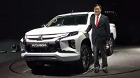 CEO Mitsubishi Motors Osamu Masuko usai melakukan prosesi peluncuran new Mitsubishi Triton. (Septian/Liputan6.com)