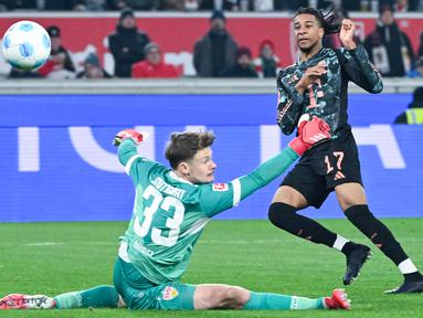 Bayern Muenchen semakin memperkukuh posisinya di puncak klasemen Liga Jerman setelah meraih kemenangan 3-1 atas VfB Stuttgart dalam laga pekan ke-24 di Stadion Mercedes-Benz Arena, Muenchen, Sabtu (1/3/2025) dini hari WIB. (Marijan Murat/dpa via AP)