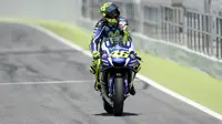 Pembalap Movistar Yamaha, Valentino Rossi. (JOSEP LAGO / AFP)